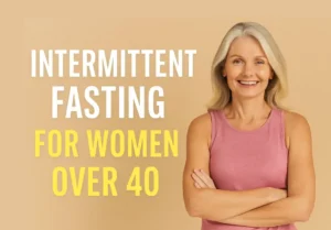 Smiling middle-aged woman in a pink tank top with text "Intermittent Fasting for Women Over 40" on a beige background